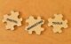 Wooden jigsaw puzzle with text DIGITAL MARKETING TOOLS.